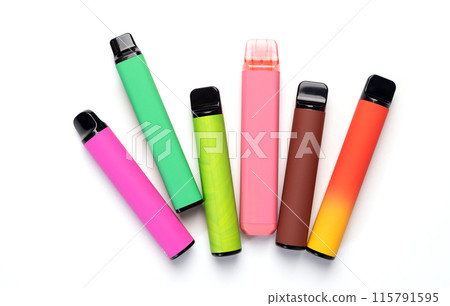 A set of colorful disposable electronic cigarettes of different shapes on a white background. modern smoking.  115791595