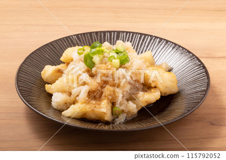 Deep-fried cod with grated daikon radish and ponzu sauce Deep-fried cod with grated daikon radish and ponzu sauce 115792052