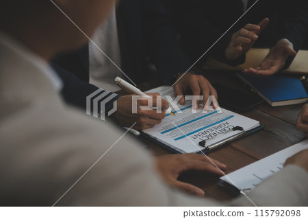 Judge gavel with Justice lawyers having team meeting at law firm background. Concepts of Law and Legal services. Judge gavel with Justice lawyers having team meeting at law firm background. Concepts of Law and Legal services. 115792098