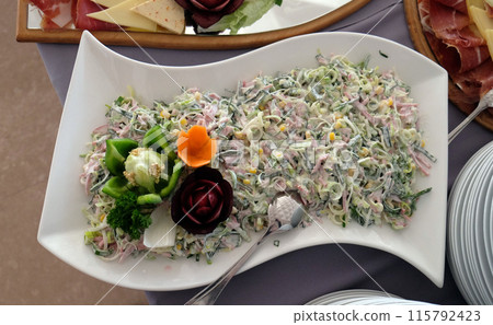 Classic Croatian plate with fine salad with ham 115792423