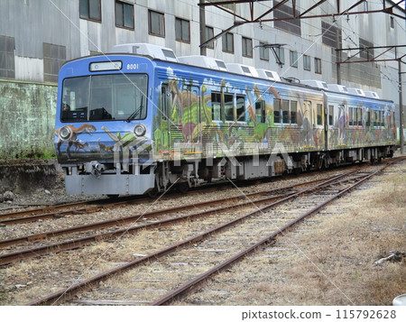 Echizen Railway, dinosaur-wrapped trains lined up at the depot 115792628