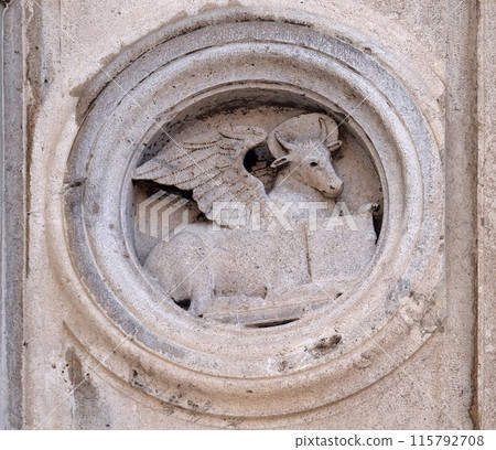 Symbol of Saint Luke the Evangelist the marble pulpit by Jacopo e Paolo da Ferrara, dated 1501, Modena Cathedral, Italy 115792708