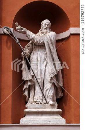 Saint Barnabas statue on the portal of St. Barnabas Church in Modena, Italy 115792773