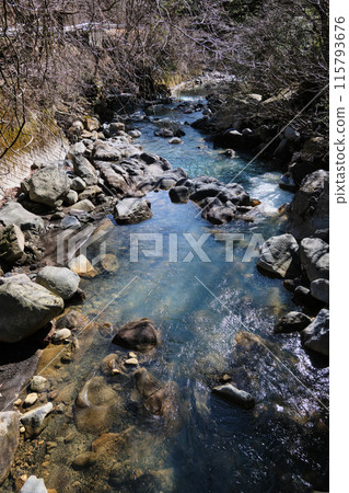 Beautiful blue river scenery Beautiful blue river scenery 115793676