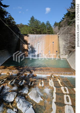 Artificial waterfall pool on the blue river 115793682