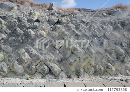 Steam rising from concrete 115793868