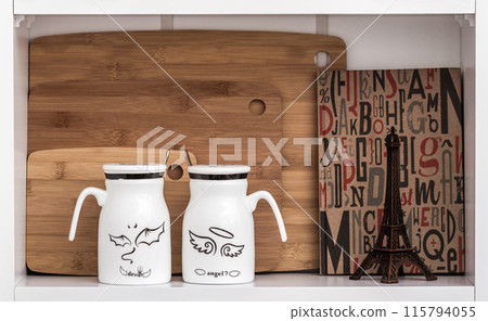 Big White Mugs with Spoon and Angel Design on White Shelf Big White Mugs with Spoon and Angel Design on White Shelf 115794055