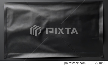 Black Sealed Plastic Packaging Bag for Storage and Shipping on Dark Background 115794858
