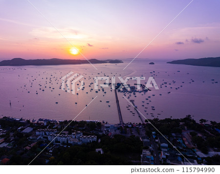 Aerial View Drone shot of Yacht and sailboat parking in marina, Transportation and travel background, Beautiful sea in sunset or sunrise sky Aerial View Drone shot of Yacht and sailboat parking in marina, Transportation and travel background, Beautiful sea in sunset or sunrise sky 115794990