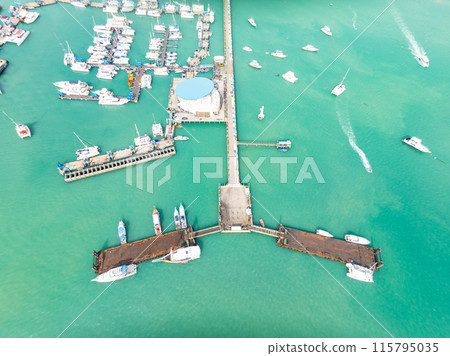 Aerial View Drone shot of Yacht and sailboat parking in marina, Transportation and travel background, Beautiful sea in summer season Aerial View Drone shot of Yacht and sailboat parking in marina, Transportation and travel background, Beautiful sea in summer season 115795035