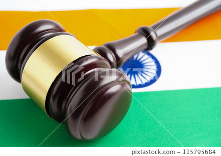 India, Legal, justice and agreement, wooden court gavel on flag. 115795684
