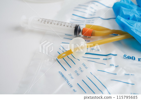 Foley catheter and urine drainage bag collect urine for disability or patient in hospital. Foley catheter and urine drainage bag collect urine for disability or patient in hospital. 115795685
