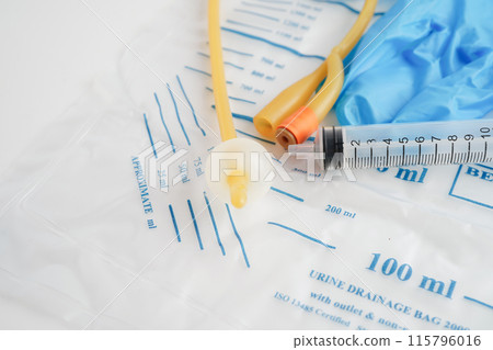 Foley catheter and urine drainage bag collect urine for disability or patient in hospital. Foley catheter and urine drainage bag collect urine for disability or patient in hospital. 115796016