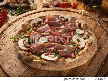 Gourmet prosciutto and mushroom pizza Gourmet prosciutto and mushroom pizza 115796874