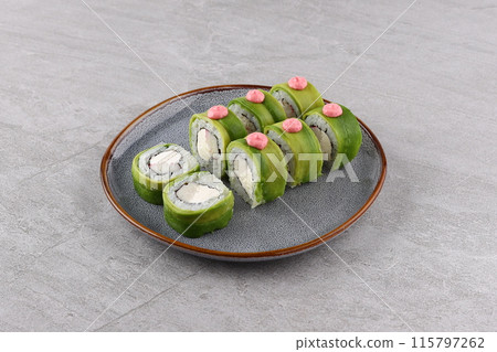 Philadelphia roll sushi with salmon, prawn, avocado, cream cheese. Sushi menu. Japanese food. Philadelphia roll sushi with salmon, prawn, avocado, cream cheese. Sushi menu. Japanese food. 115797262