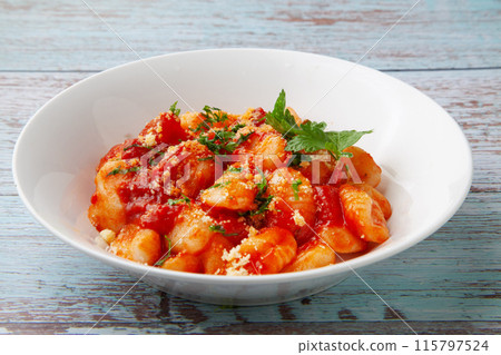 Gnocchi of tomato sauce Gnocchi of tomato sauce 115797524
