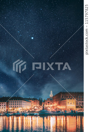 Stockholm, Sweden. Scenic Famous View Of Embankment In Old Town Of Stockholm In Night Lights. Great Church Or Church Of St. Nicholas And Royal Palace. Famous Popular Destination Scenic Place In Light 115797825