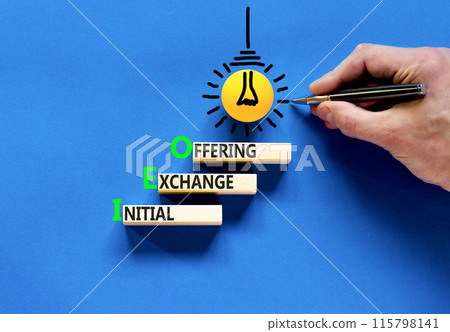 IEO initial exchange offering symbol. Concept words IEO initial exchange offering on beautiful wooden blocks. Beautiful blue background. Business IEO initial exchange offering concept. Copy space. 115798141