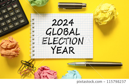 2024 global election year symbol. Concept words 2024 global election year on beautiful white note. Beautiful yellow background. Calculator. Business 2024 global election year concept. Copy space 2024 global election year symbol. Concept words 2024 global election year on beautiful white note. Beautiful yellow background. Calculator. Business 2024 global election year concept. Copy space 115798237