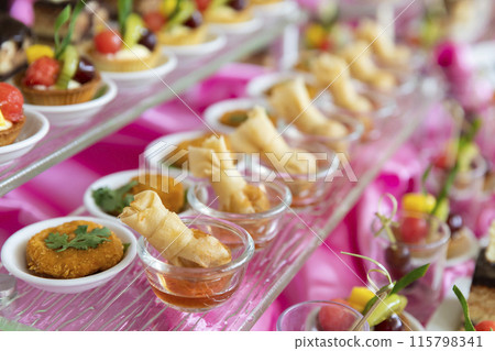 Collection of delicious snack and dessert for party or wedding, gastronomy, event organization concept. 115798341