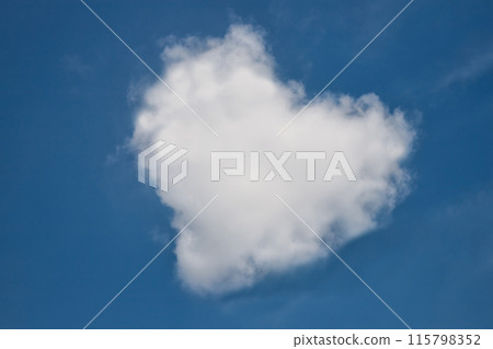 Heart shaped cloud in bright blue sky. Heart shaped cloud in bright blue sky. 115798352