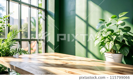 A wooden table against the backdrop of a window and a green wall filled with sunlight.Mockup A wooden table against the backdrop of a window and a green wall filled with sunlight.Mockup 115799066