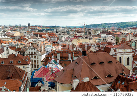 Panoramic cityscape of Prague showcasing its unique architecture and charming red roofs Panoramic cityscape of Prague showcasing its unique architecture and charming red roofs 115799322
