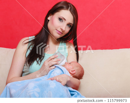 Mother holding her little newborn baby Mother holding her little newborn baby 115799973