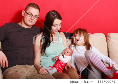 Family photo of mother, baby, daughter and father 115799975