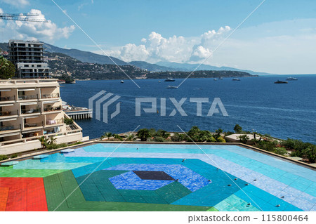 Amazing coastline of French Riviera with pool (or fountain) and buildings in Monte Carlo (Monaco) Amazing coastline of French Riviera with pool (or fountain) and buildings in Monte Carlo (Monaco) 115800464