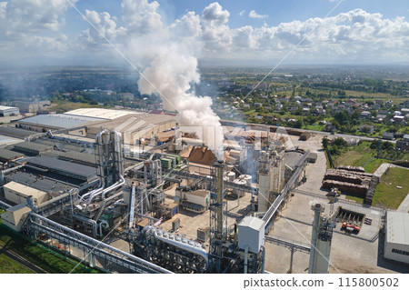 Aerial view of factory with high plant manufacture structure. Global production and manufacturing concept. Aerial view of factory with high plant manufacture structure. Global production and manufacturing concept. 115800502