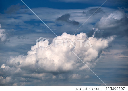 Bright landscape of white puffy cumulus clouds on blue clear sky. 115800507