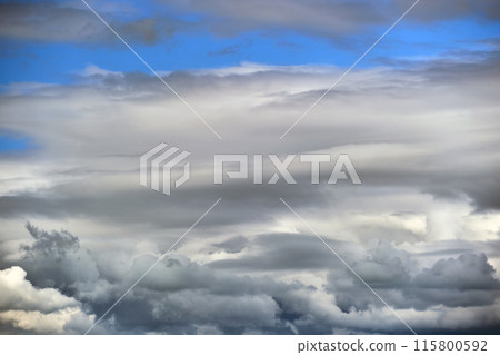 Landscape of dark clouds forming on stormy sky during thunderstorm. 115800592