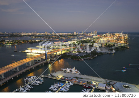 Miami marina bay with luxury sailboats. Expensive yachts and motorboats docked in Biscayne Bay harbor in Brickell downtown Miami marina bay with luxury sailboats. Expensive yachts and motorboats docked in Biscayne Bay harbor in Brickell downtown 115800720