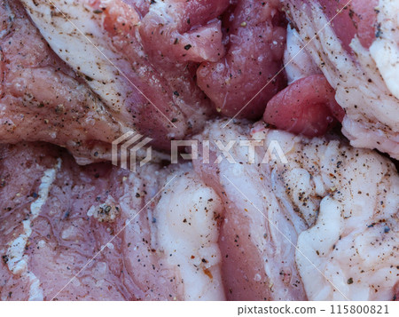 A close-up view of raw meat marinated with salt and spices A close-up view of raw meat marinated with salt and spices 115800821