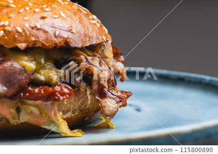 Close-up shot of the burger with bacon 115800890