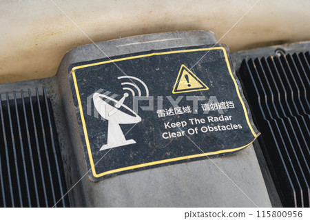 Radar warning sign sticker with a satellite dish and an exclamation text 115800956