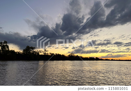 Summer sunset on the Parana river,Islands in backlit Summer sunset on the Parana river,Islands in backlit 115801031