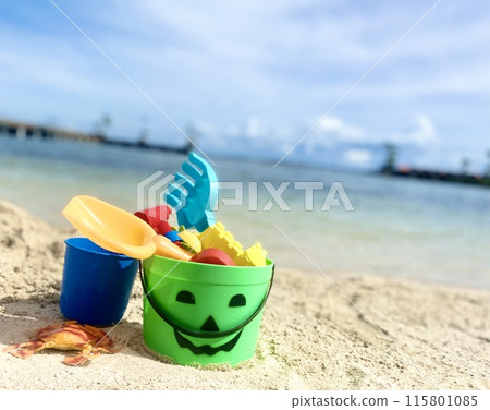 Baby playing on the beach Baby playing on the beach 115801085