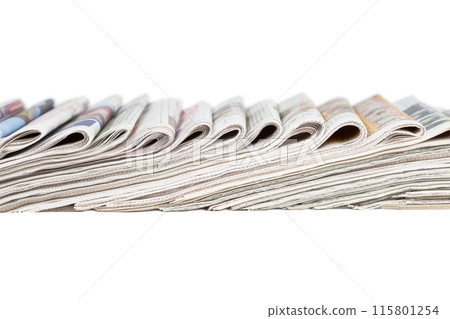 Assortment of folded newspapers 115801254