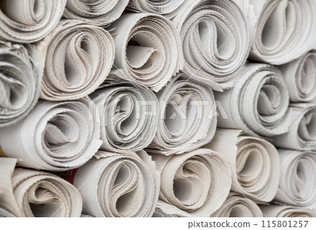 Rolls of newspapers. 115801257