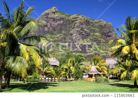 Mauritius, an island nation also known as the Lady of the Indian Ocean, with a view of the World Heritage site of Mount Le Morne from the resort area of the Brabant Peninsula 115803661