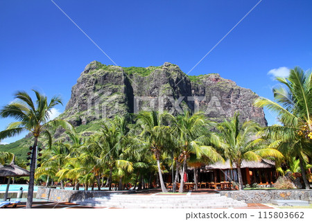 Mauritius, an island nation also known as the Lady of the Indian Ocean, with a view of the World Heritage site of Mount Le Morne from the resort area of the Brabant Peninsula 115803662
