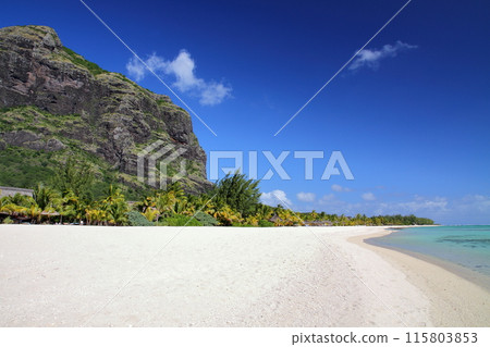 "The Lady of the Indian Ocean" island nation of Mauritius - a view of the World Heritage site of Mount Le Morne from a beach on the resort island of Brabant Peninsula 115803853