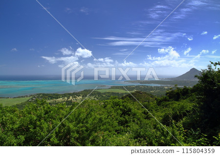 View of the lagoon and Mount Le Morne from the observation deck in Chamarel village, Black River, Mauritius, the Lady of the Indian Ocean View of the lagoon and Mount Le Morne from the observation deck in Chamarel village, Black River, Mauritius, the Lady of the Indian Ocean 115804359