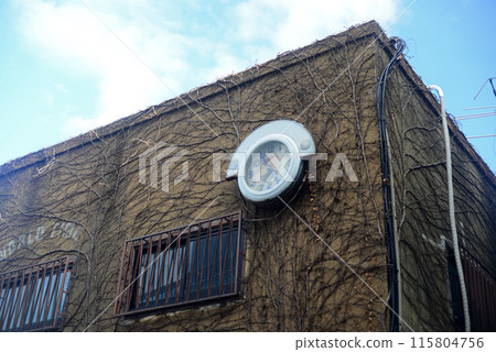 Retro building exterior with wall clock-5 115804756