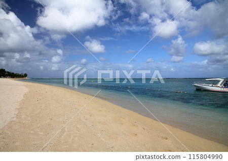 Mauritius, the Lady of the Indian Ocean: The beaches and blue sea of the Brabant Peninsula, a resort town at the foot of Mount Le Morne, a World Heritage Site Mauritius, the Lady of the Indian Ocean: The beaches and blue sea of the Brabant Peninsula, a resort town at the foot of Mount Le Morne, a World Heritage Site 115804990