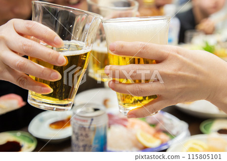 Toasting at a home party Toasting at a home party 115805101