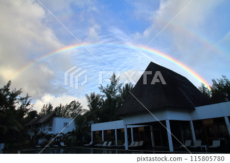 A rainbow appears in Mauritius, the Lady of the Indian Ocean, on the Brabant Peninsula, a resort town at the foot of Mount Le Morne, a World Heritage Site 115805780