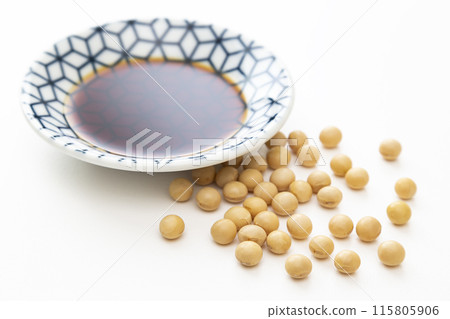 soy sauce and soybeans on white background soy sauce and soybeans on white background 115805906